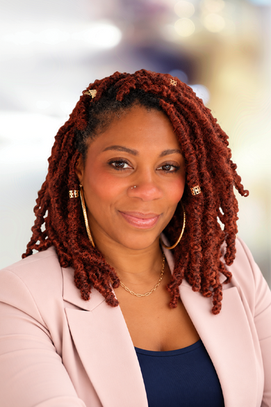 Portrait of Desiree Clark, REALTOR®.